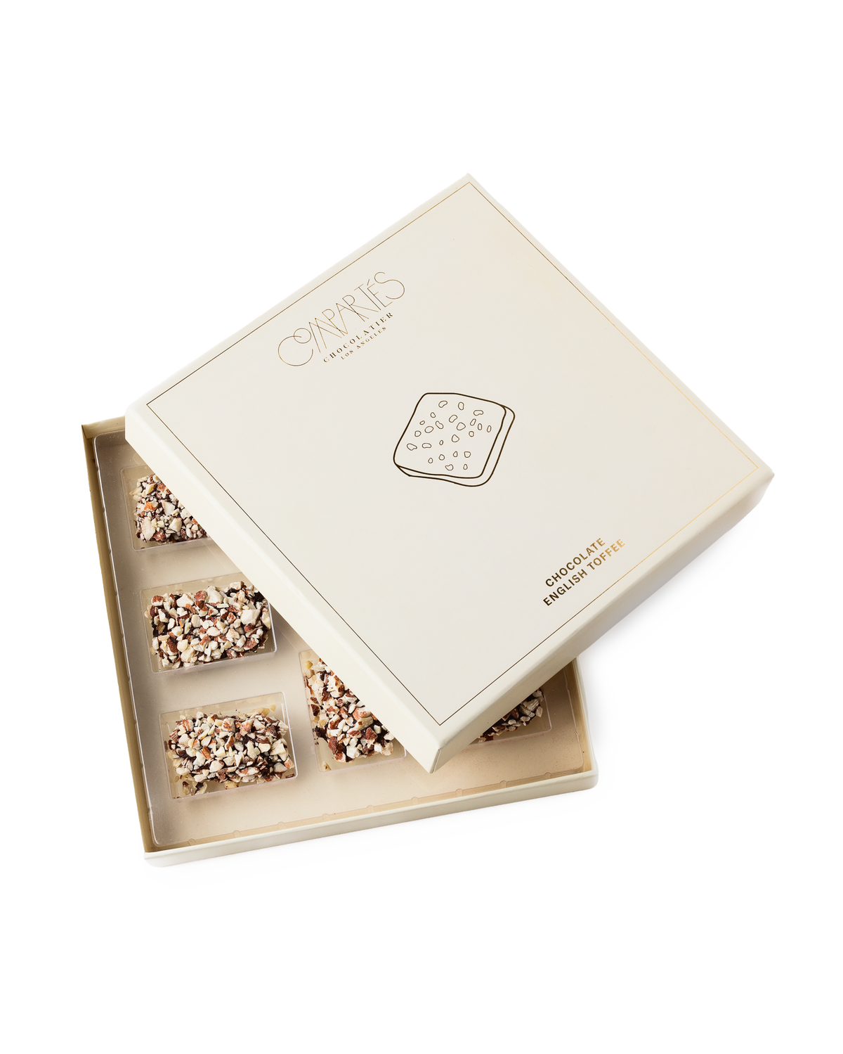 Compartes best chocolate covered english toffee gift box, cream and gold lid set at an angle, almond