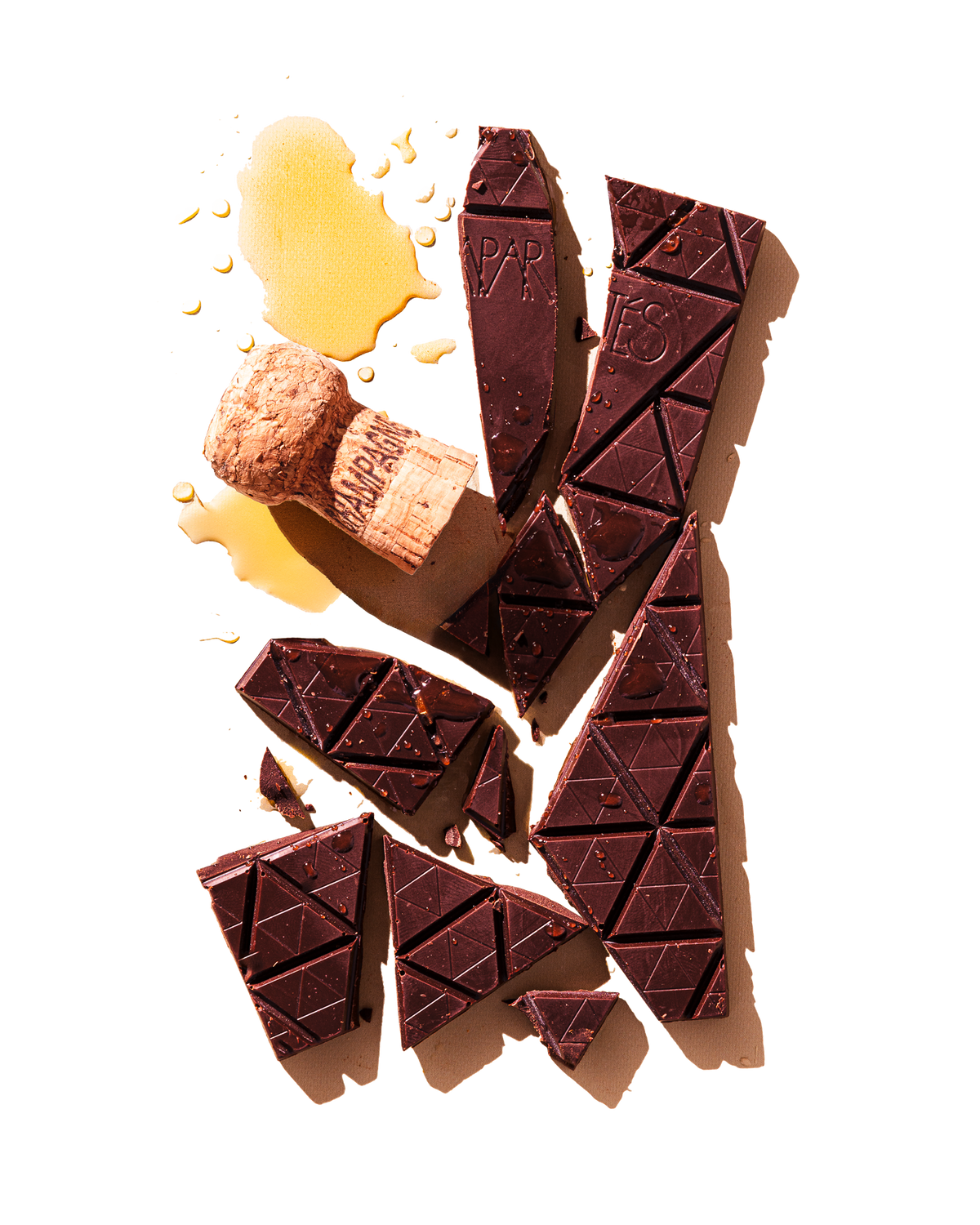 Compartes luxury champagne dark chocolate gift bar, with a cork and a pour of champagne