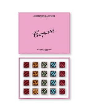 Compartes gourmet Vegan chocolate truffles in a pink gift box, squares in rich red, gold and blue patterns