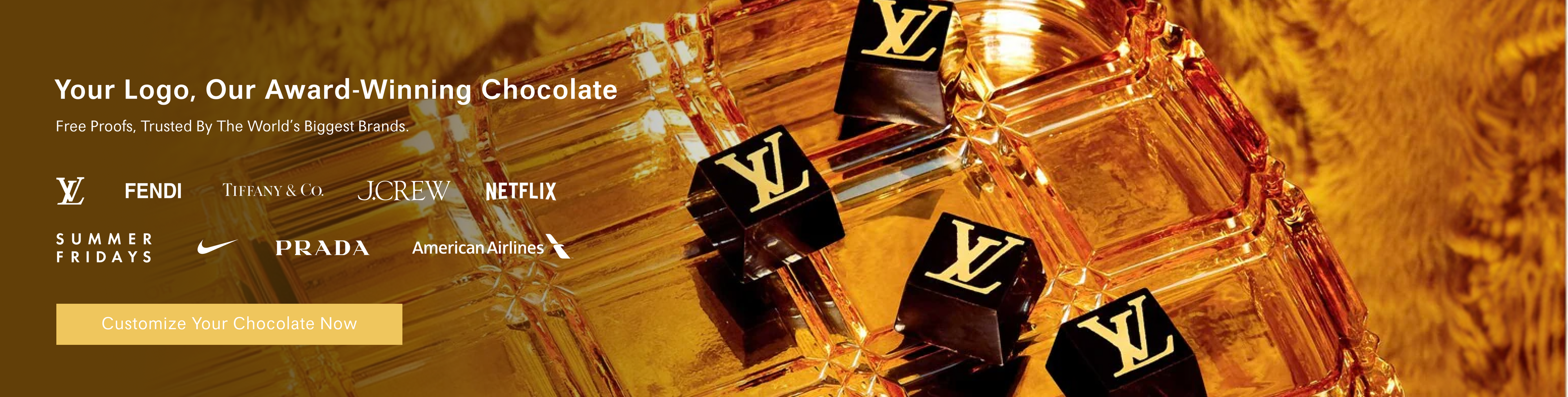 Custom logo gourmet chocolate cubes displayed on a glass tray with luxury brand logo examples for corporate chocolate gifts.