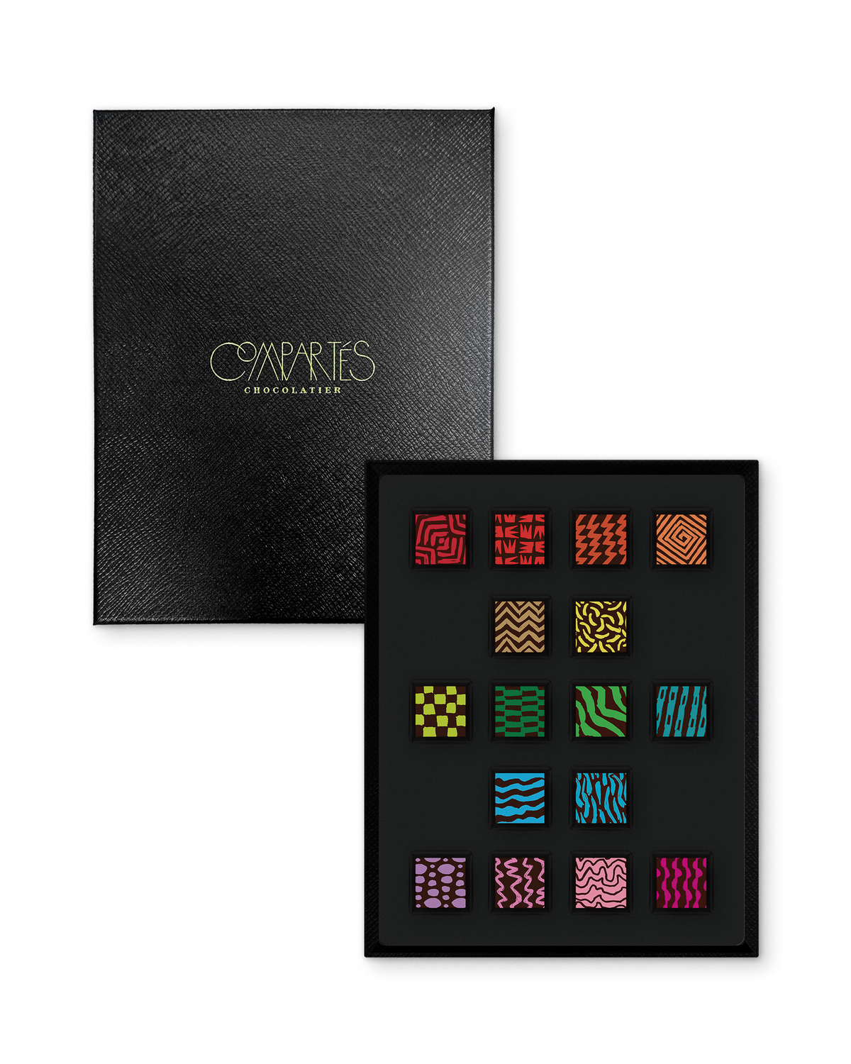 Compartes best chocolate gift box, patterned truffles in rich red, green and pink, black leathered lid