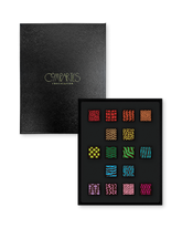Compartes best chocolate gift box, patterned truffles in rich red, green and pink, black leathered lid