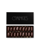Compartes best chocolate covered dates in a long black gift box, dark chocolate finish