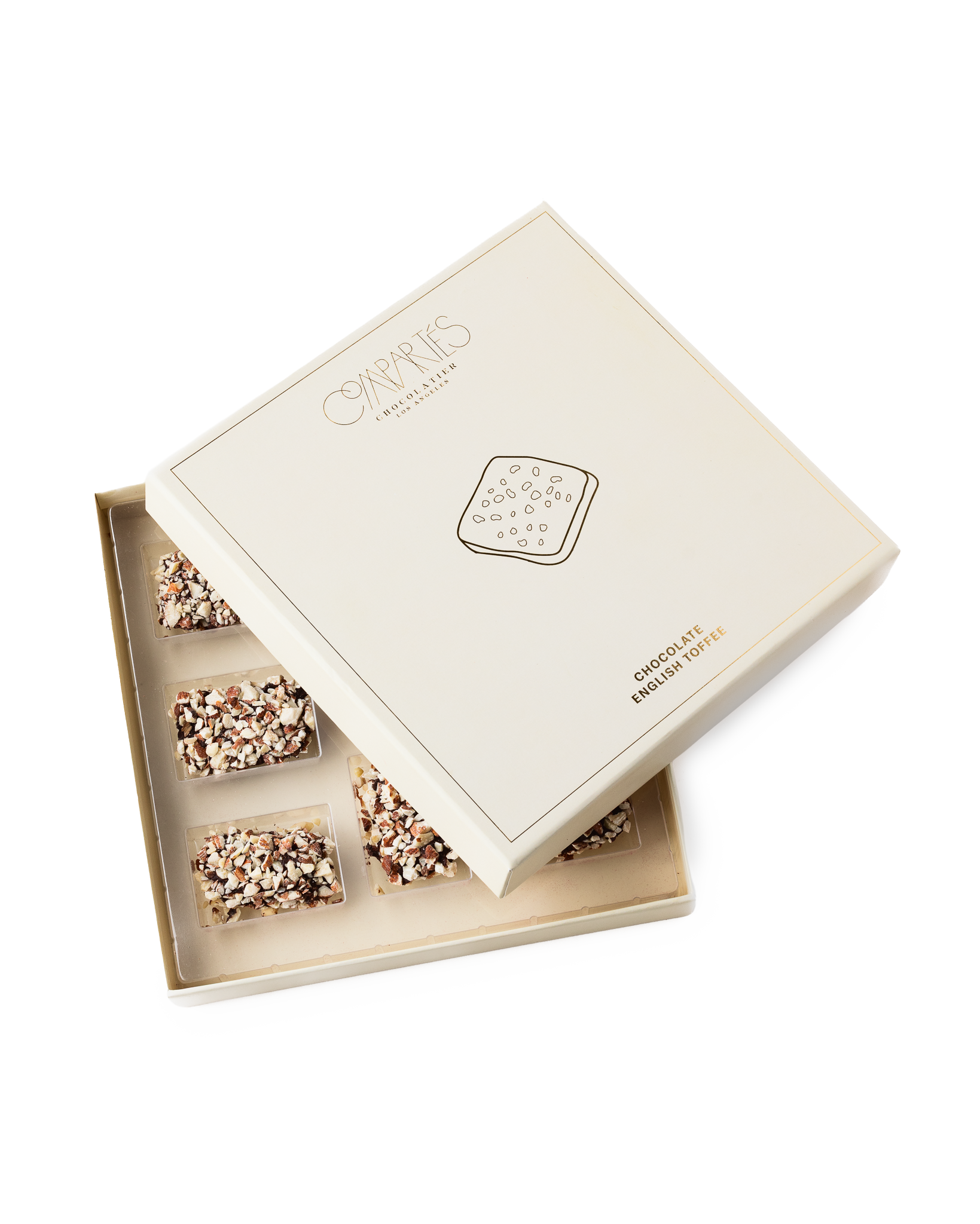 Compartes best chocolate covered english toffee gift box, cream and gold lid set at an angle, almond