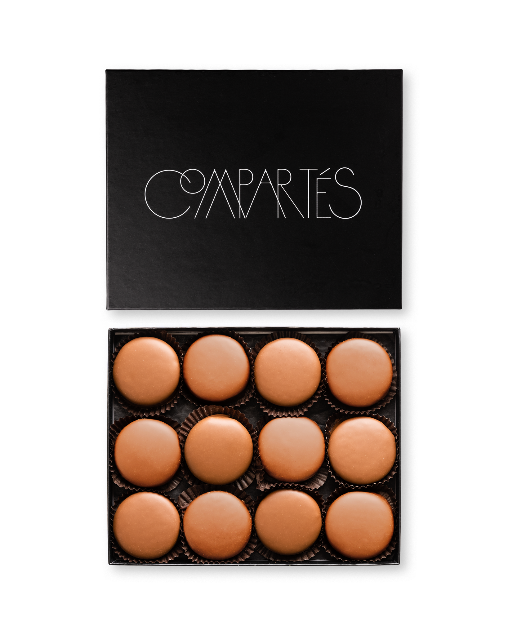 Compartes best milk chocolate dipped sandwich cookies, smooth round pieces in a black gift box