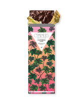 Compartes best chocolate gift bar, dark chocolate pretzel in a pink and green palm tree wrapper, sourdough and sea salt