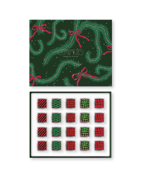 Compartes luxury Christmas chocolate truffles in a green pine print gift box, squares in rich red and green