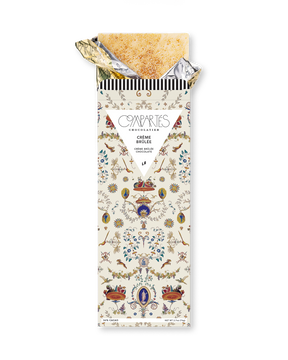 Compartes gourmet chocolate gift bar, creme brulee white chocolate in a cream ornamental wrapper