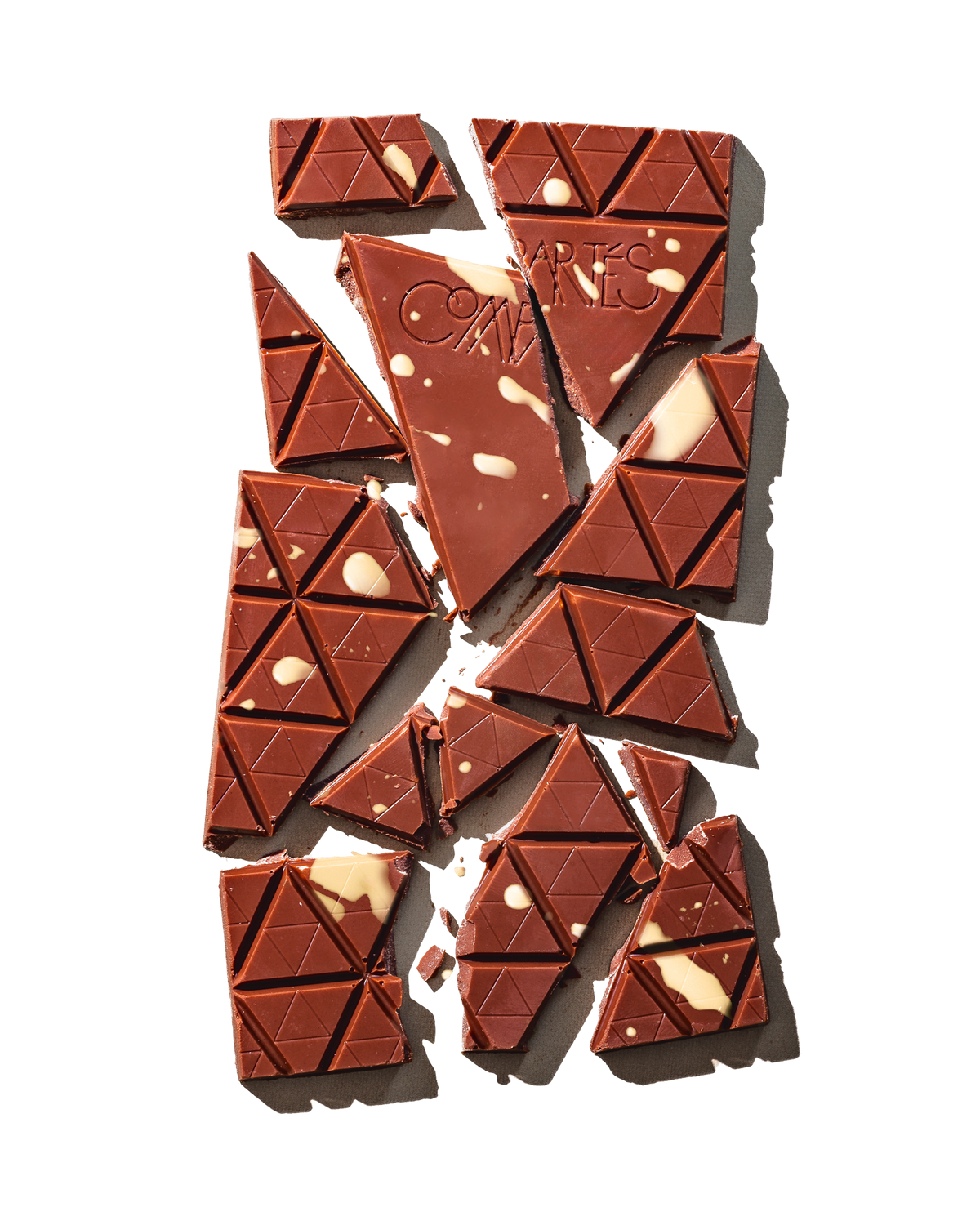 Compartes luxury chocolate gift, milk chocolate eggnog bar with a faceted triangle finish, nutmeg