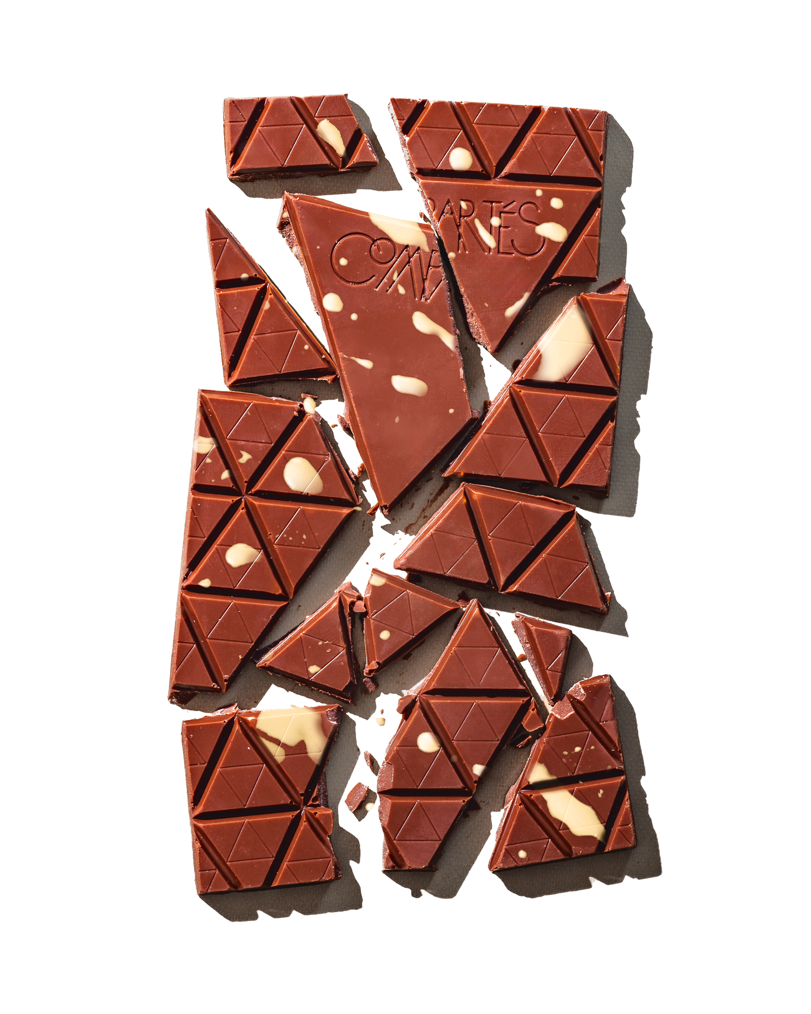 Compartes luxury chocolate gift, milk chocolate eggnog bar with a faceted triangle finish, nutmeg