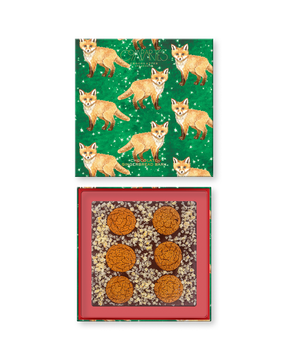 Compartes gingerbread bark chocolate luxury gift box, green fox lid and cookies set into the bark, crystallized ginger