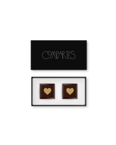 Compartes gourmet chocolate wedding favor, dark chocolate squares with gold hearts in a black gift box