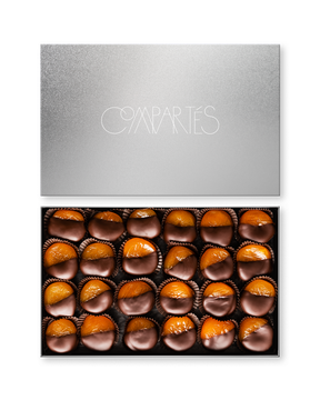 Compartes gourmet dark chocolate dipped apricots gift box, amber fruit in rows under a silver lid