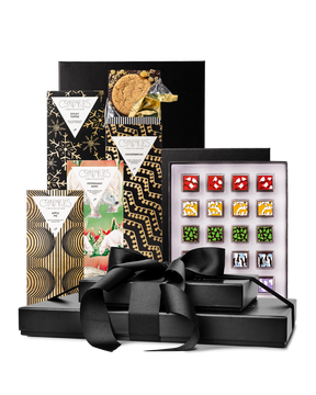 Compartes best Christmas chocolate gift tower, black boxes with a ribbon, gold snowflake bars and truffles