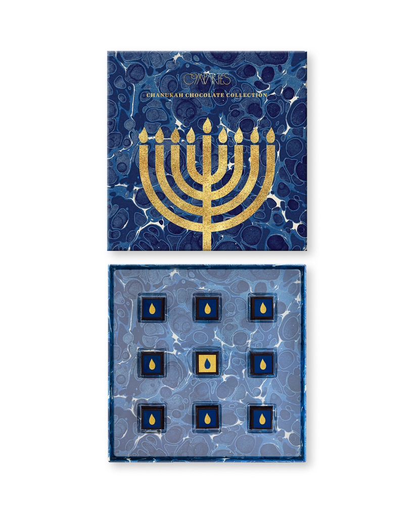 Compartes luxury Hanukkah chocolate gift box, blue marbled lid with a gold menorah, chocolates with gold flames
