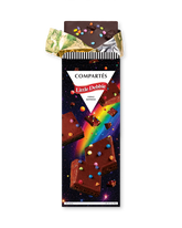 A Compétés Little Debbie cosmic brownies chocolate bar in its wrapper, with the gold foil wrapper partially peeled back at the top. The wrapper features a colorful design with brownies, and a rainbow on a starry space background.
