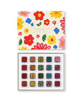 Compartes luxury chocolate truffle gift box, signature truffles in deep red and yellow patterns, floral lid