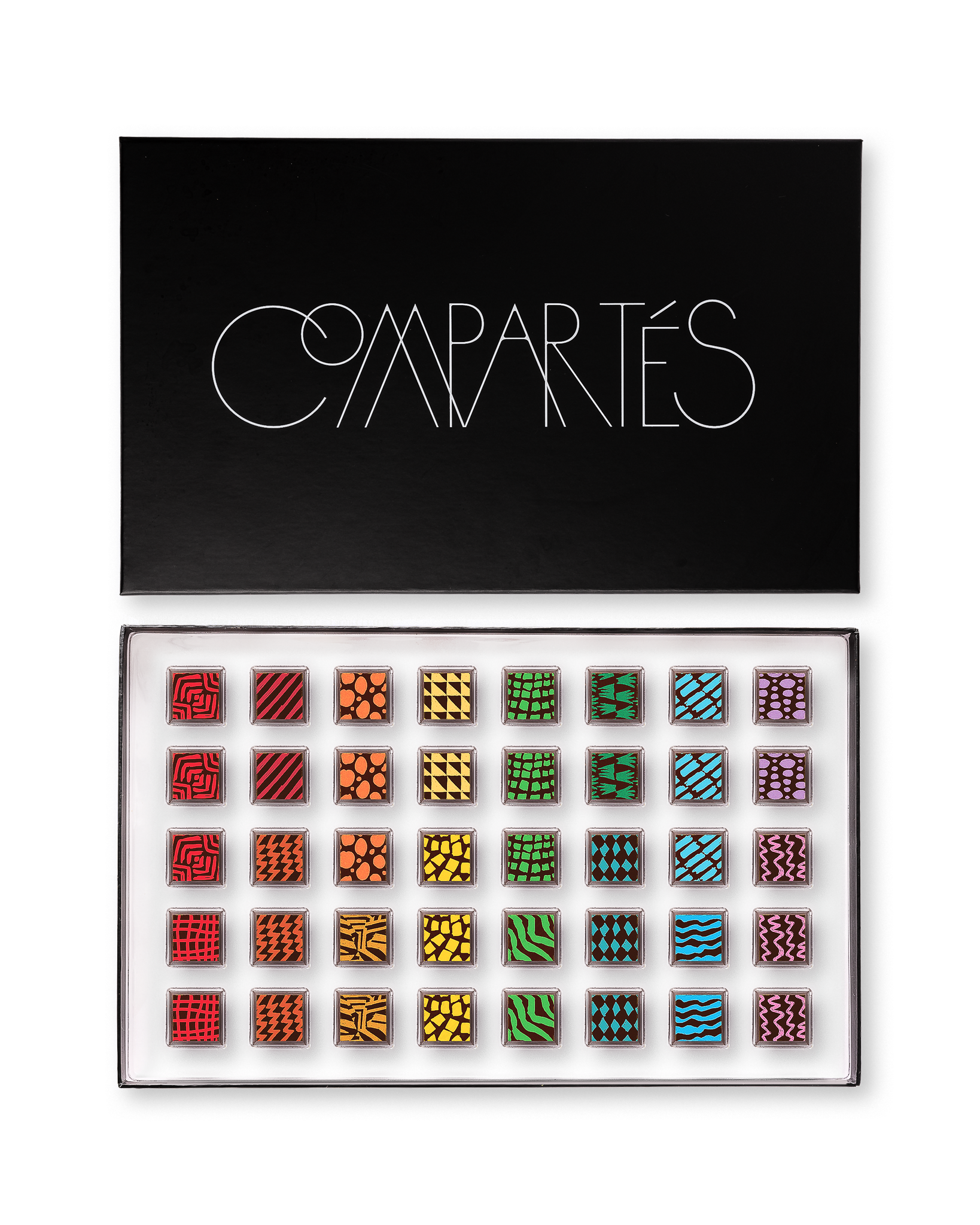 Compartes luxury signature chocolate truffles in a black gift box, squares in rich red, gold and green patterns