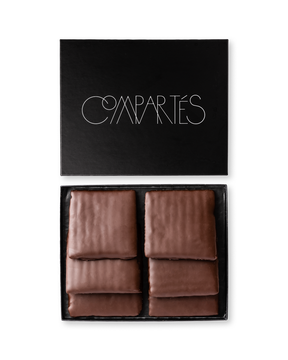 Compartes luxury chocolate covered matzo gift box, milk chocolate coated sheets in a black box