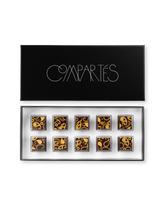 Compartes luxury Macallan scotch whiskey truffles, dark chocolate squares in gold paisley patterns, chocolate gift