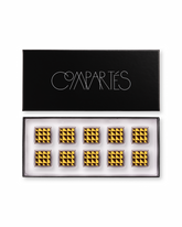 Compartes peanut butter sea salt gourmet chocolates, squares in deep gold and black triangles, chocolate gift