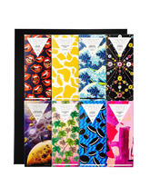 Compartes best premium chocolate bar gift set, illustrated wrappers laid in a black chocolate gift box