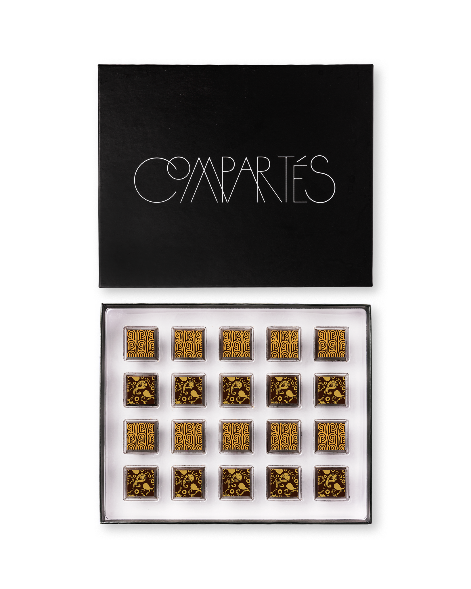 Compartes best boozy chocolate gift box, gold patterned truffles under a black lid, champagne and whiskey