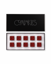 Compartes luxury raspberry chocolate truffles gift box, squares in deep red and black patterns