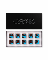 Compartes best salted caramels, dark chocolate sea salt squares in deep blue wave patterns, chocolate gift