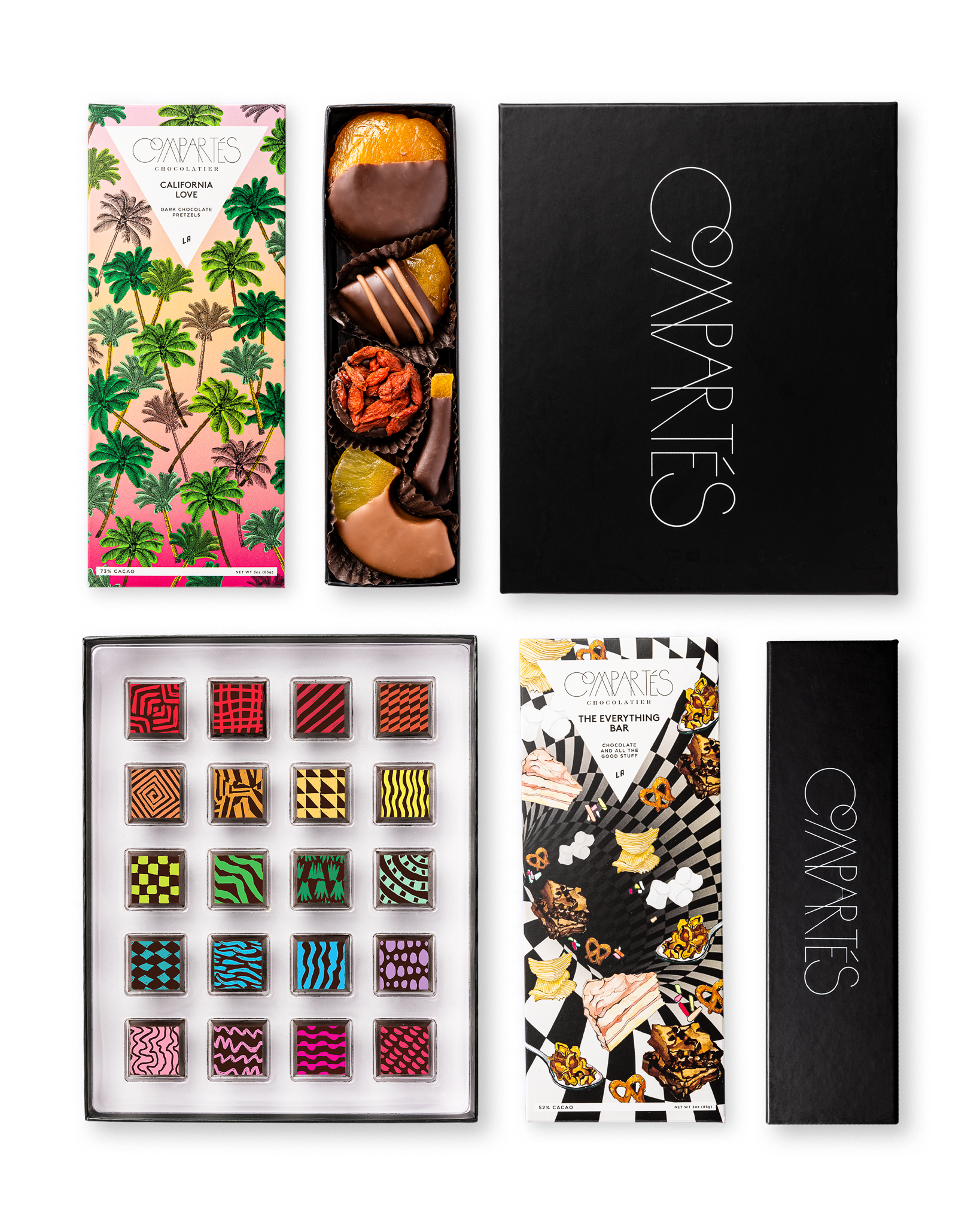 Compartes gourmet signature chocolate gift tower, black boxes with printed bars, truffles and designer chocolates