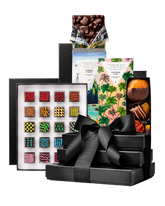 Compartes gourmet signature chocolate gift tower, black boxes with a satin bow, designer chocolates and bars