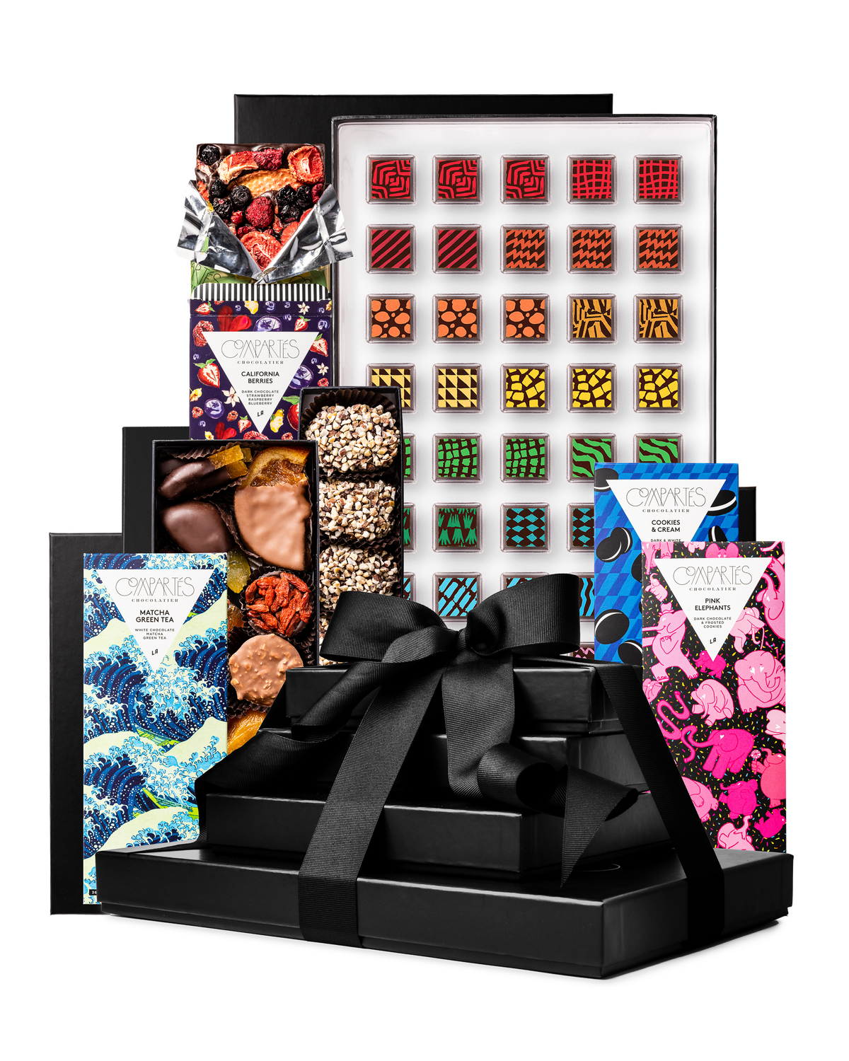 Compartes best chocolate gift tower, stacked black boxes with a satin bow, patterned truffles and bars