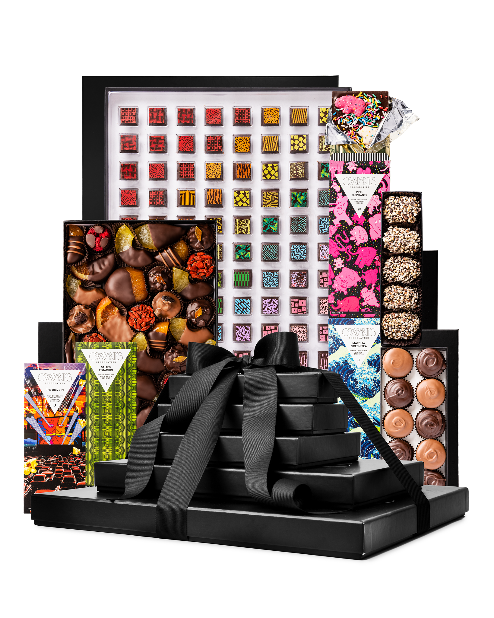 Compartes gourmet chocolate gift tower, black boxes with a satin bow, patterned truffles, bars and clusters