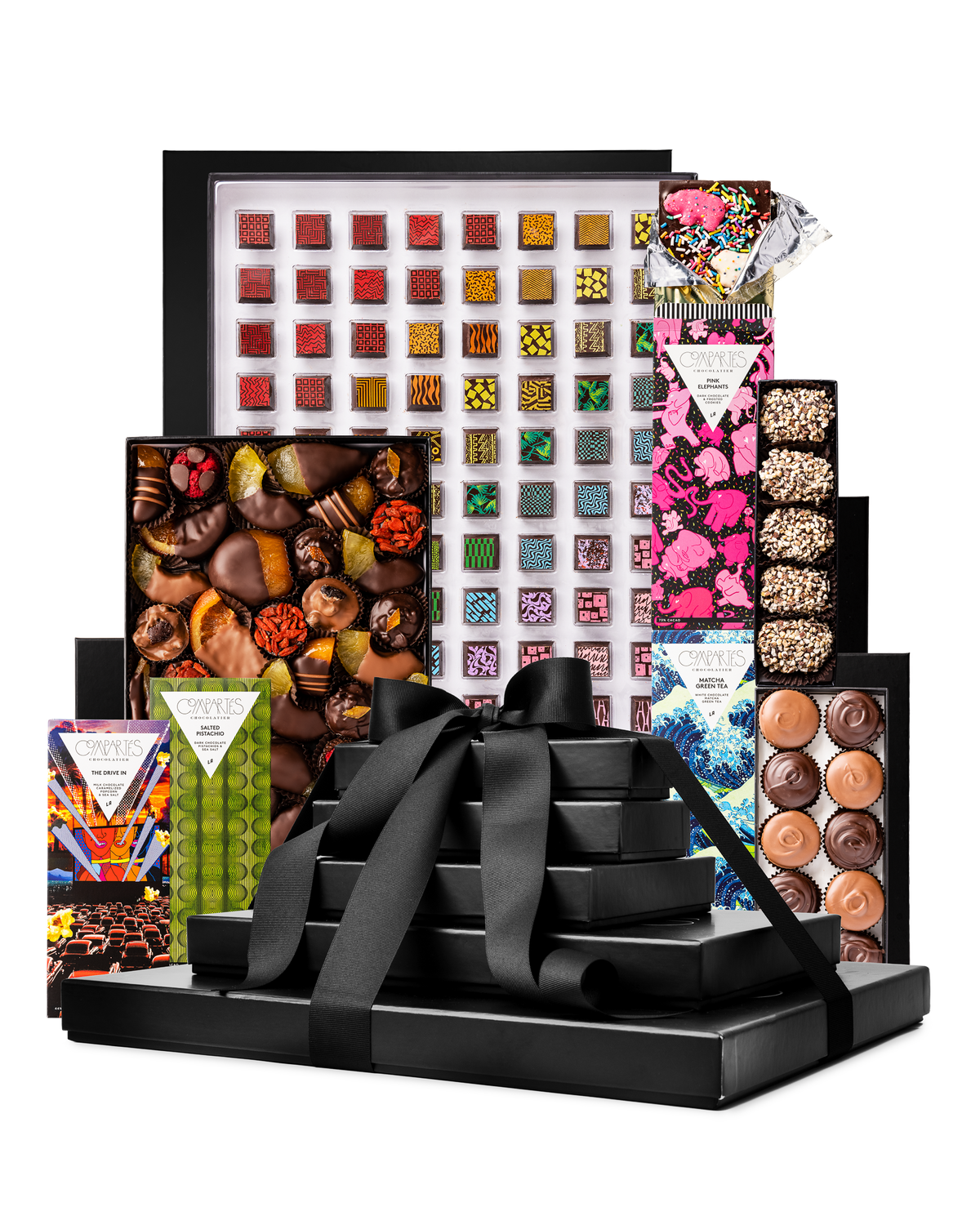 Compartes gourmet chocolate gift tower, black boxes with a satin bow, patterned truffles, bars and clusters