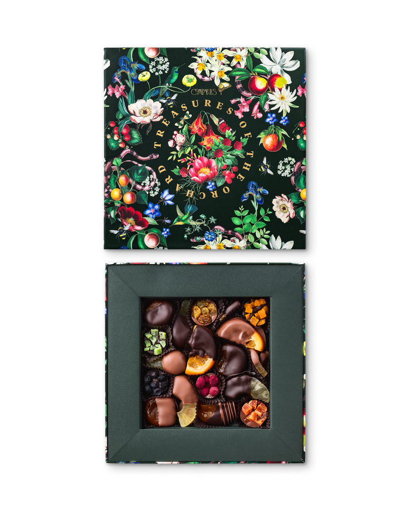 Compartes luxury chocolate fruit gift box, dark chocolate dipped fruit under a deep green botanical lid