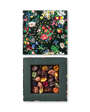 Compartes luxury chocolate fruit gift box, dark chocolate dipped fruit under a deep green botanical lid